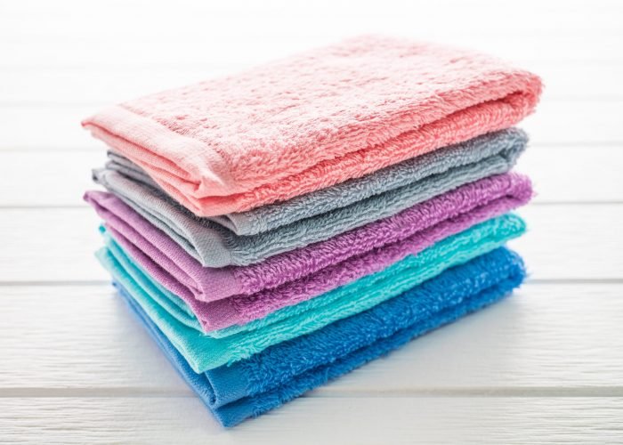 color of bath towel on white wooden background